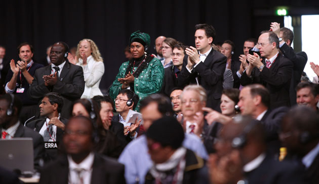 Copenhagen: the result: Ed Miliband and others applaud as the Copenhagen accord is adopted