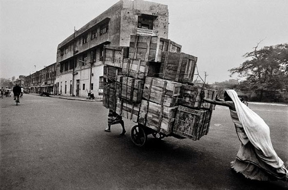Raghu Rai: Woman Cart Pusher, Delhi by Raghu Rai, 1979