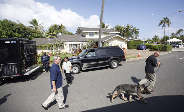 Obs Obamas on holiday: Secret Service agents at Kailuana Place where the Obamas are staying