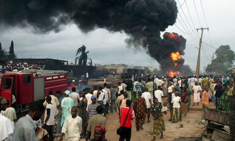 A ruptured pipeline burns in a Lagos suburb after an explosion in 2008 which killed at least 100 people.