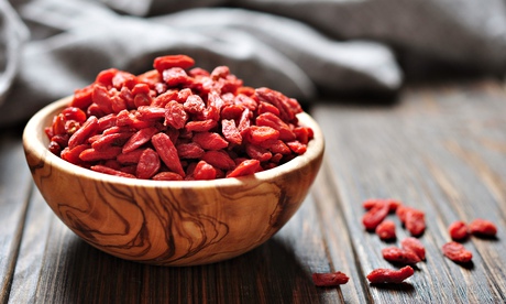 wooden bowl with goji berries 