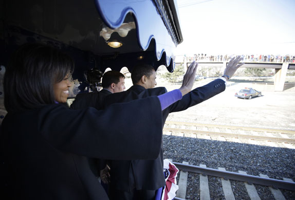 Gallery Obama train: Barack and Michelle wave to crowd