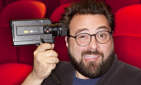 Kevin Smith holding camera