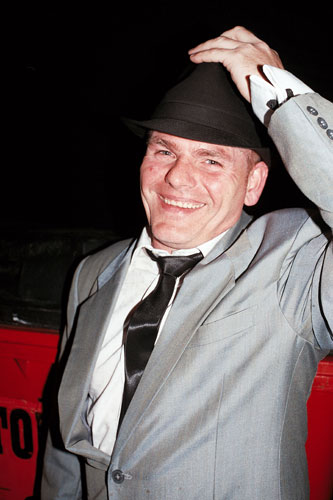 Streetlife: Phil Beatson man in bowlerhat smiling silver suit