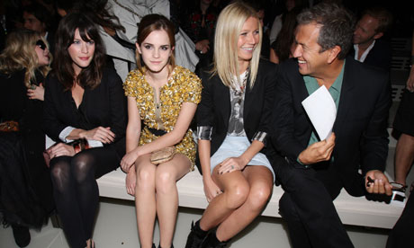 emma watson new hairstyle. Emma Watson sits between Liv