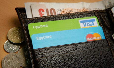 coins and cards in wallet