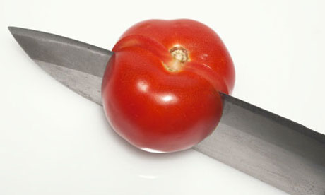 cutting a tomato