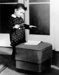 Mariss Jansons playing conductor, aged 3.