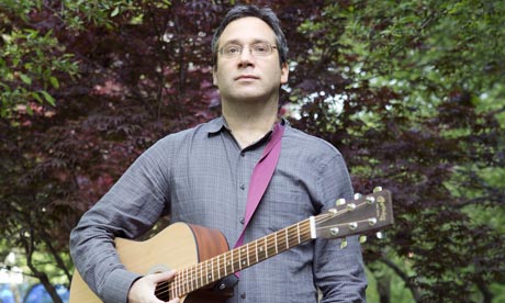 gary marcus with acoustic guitar