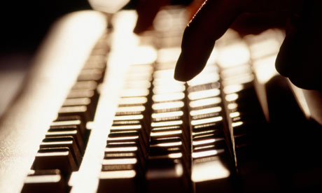 hand typing computer keyboard