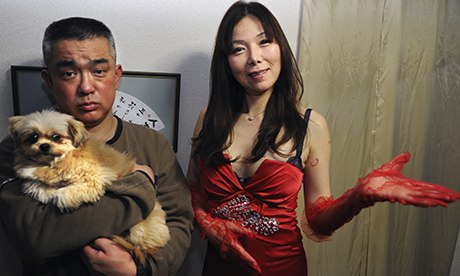 Sex counsellor Ai Aoyama with a client and her dog