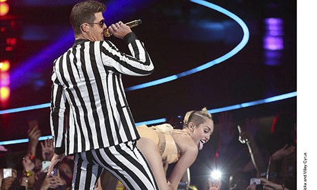 Miley Cyrus twerking onstage with Robin Thicke at the VMAs