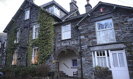 Ivy-covered stone exterior of the Oak Bank Hotel in Cumbria