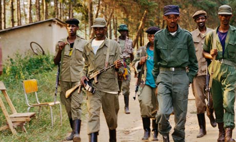Paul Kagame with his troops in Rwanda