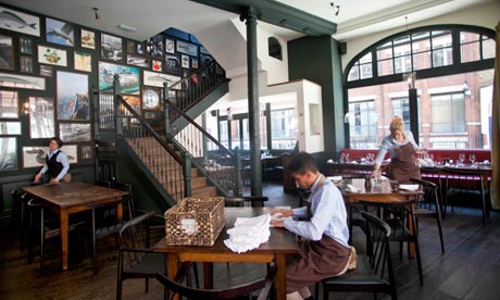 Man sitting at table in Newman Street Tavern