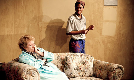 Janet Suzman on a sofa with Khayalethu Anthon behind her