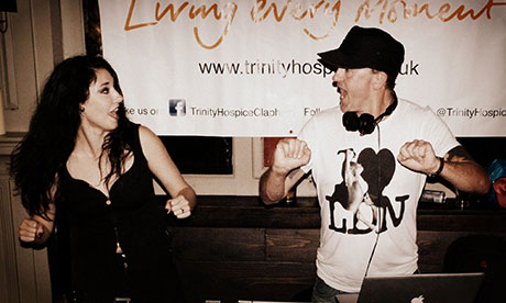 DJ Ilona Rampling dancing and looking at her husband Danny