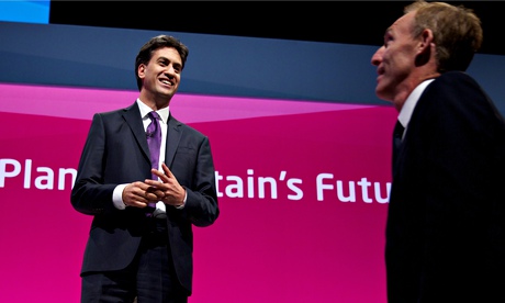 Ed Miliband welcomes Jim Murphy to the stage at Labour's 2014 conference in Manchester.