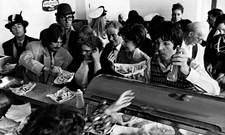 The Beatles at the counter of crowded fish and chip shop, Taunton, Somerset 1967