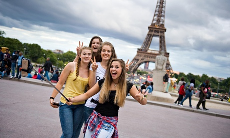 Four girls are making a selfie