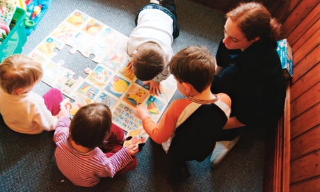 Trainee nursery worker with small children