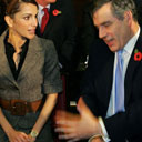 The chancellor, Gordon Brown, speaks to Queen Rania of Jordan at the Stationers Hall, central London, on November 7 2006, at a press conference to highlight the sale of inaugural bonds by the International Finance Facility for Immunisation. Photograph: Carl de Souza/AFP/Getty Images.