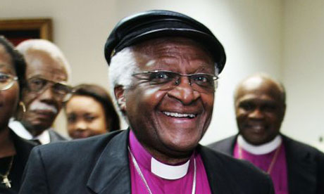 Desmond Tutu arrives at Port-Au-Prince's international airport on February 11 2006. Photograph: Roberto Schmidt/AFP/Getty Images