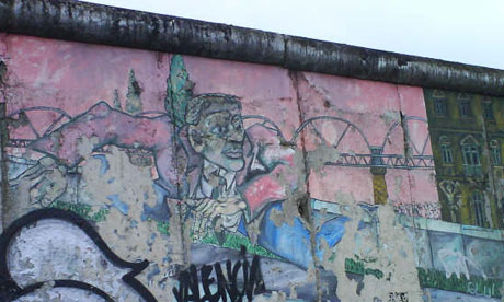 Graffiti on the East Side Gallery stretch of the Berlin Wall. Photograph: Paul Owen
