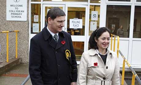 Scottish National party candidate Peter Grant and his wife Fiona vote in the Glenrothes byelection