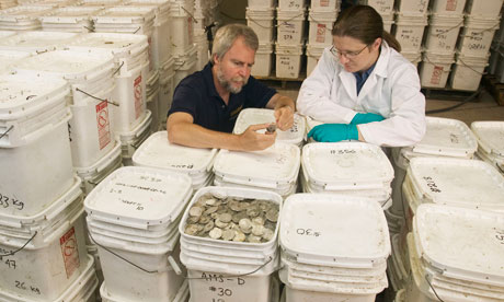 Photo provided by Odyssey Marine Exploration, of coins recovered from the shipwreck