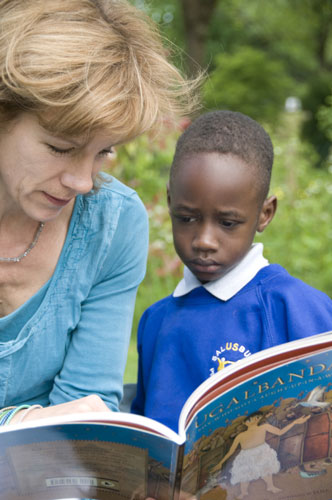 Refugee week: Juliet Stephenson reading stories with pupils at Salusbury primary school 