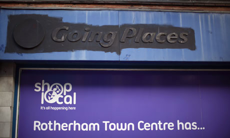 Shut shop in Rotherham with 'shop local' sign