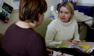 Social workers discuss case