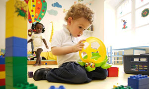 Child playing in nursery
