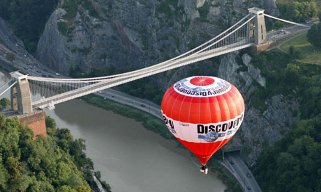 Balloon flies over the Clifton suspension bridge during the 2006 Bristol International Balloon Fiesta