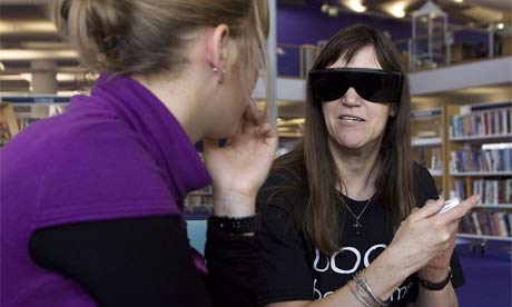 Julie Duffy, the 'visually impaired book', shares her experiences as part of the living library project at Bournemouth's central library. Photograph: Neil Turner