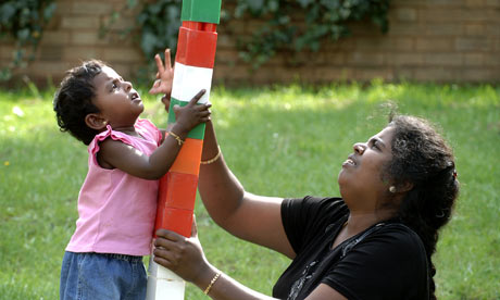 Sathana, two, and her mother at a Sure Start, project in Edmonton, north London