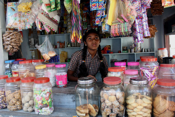 The Young Lives project: Girl on a market stall in India
