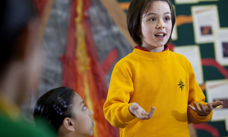 Alexandra, above, and Omar, below, present their arguments at Sir William Burrough primary school
