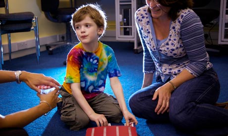 Autistic boy in Leeds library using Boardmaker software