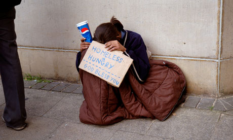 Young person homeless hungry and begging in London.