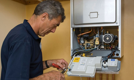 Man working on a gas boiler 2008