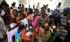 Women and children at a health centre in Katine, Uganda