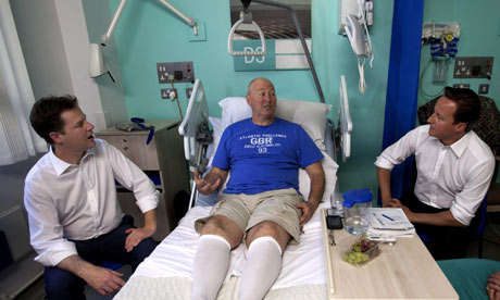 David Cameron and Nick Clegg with NHS patient
