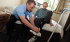 A disabled man is helped  003 Scale of cuts has no bearing on services for disabled people