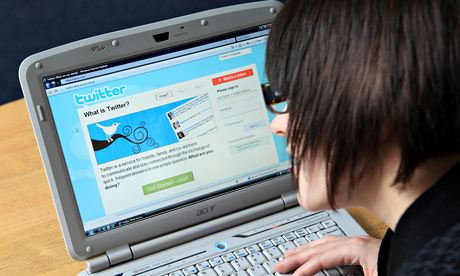 Woman using Twitter