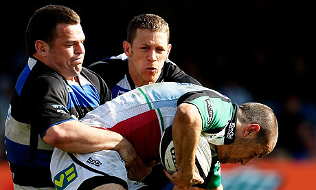 Duncan Bell, of Bath, tackles Danny Care, of Harlequins in the Guinness Premiership