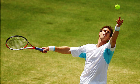 andy murray queens. Andy Murray serves during the