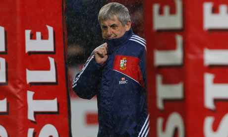 Ian McGeechan takes shelter before the Lions match against Emerging Springboks
