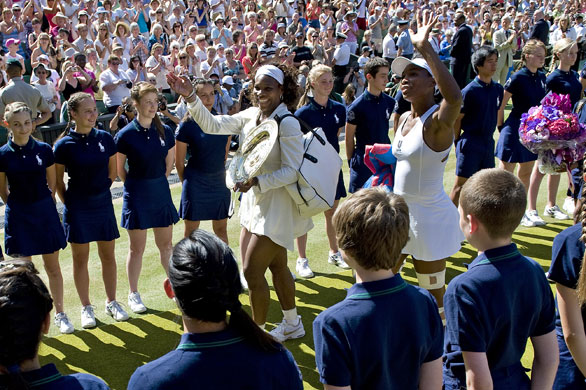 Williams: The Williams sisters depart Centre Court